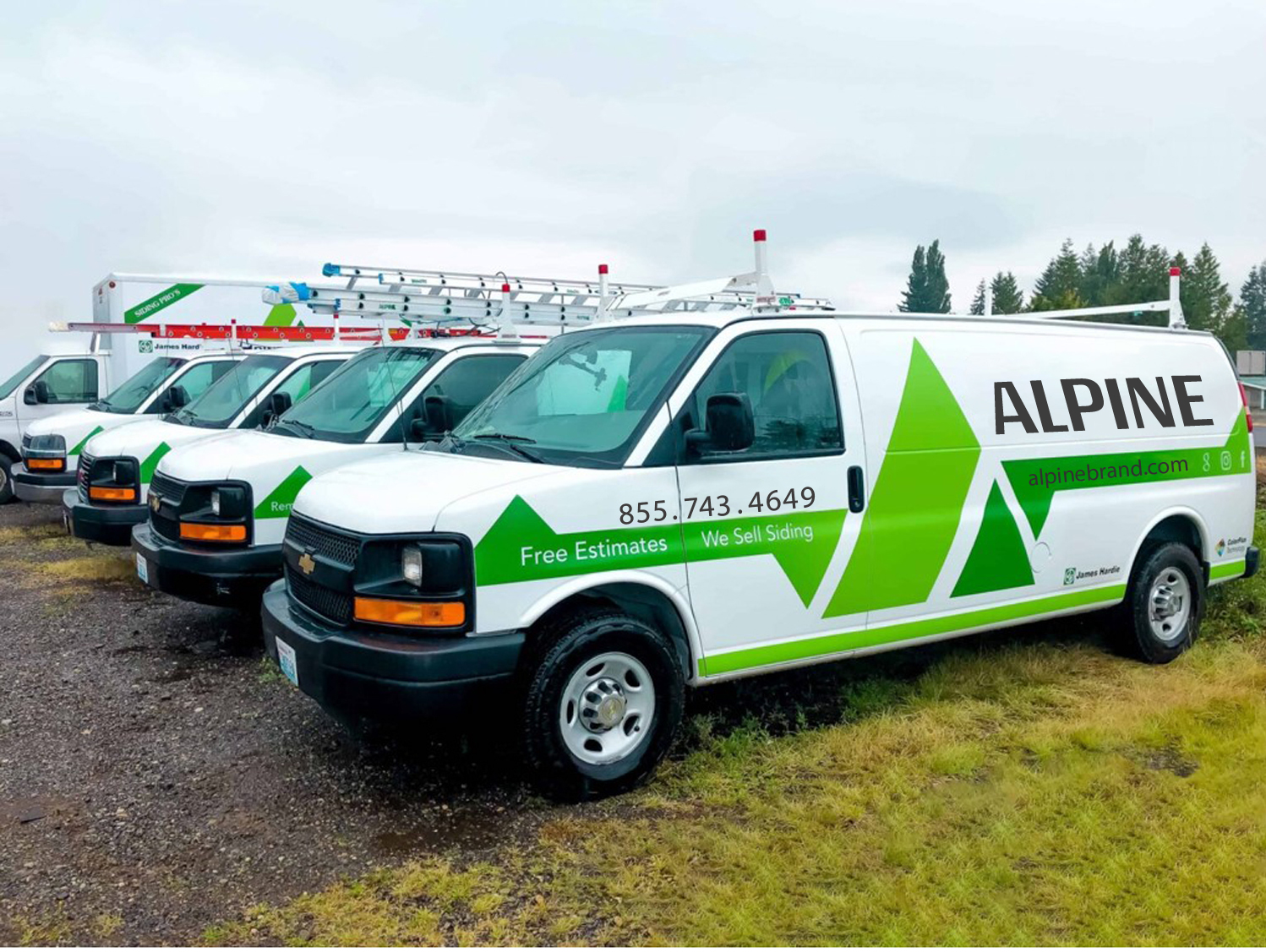 Alpine Exteriors professional van fleet with branded vehicles showcasing company presence in Sarasota FL